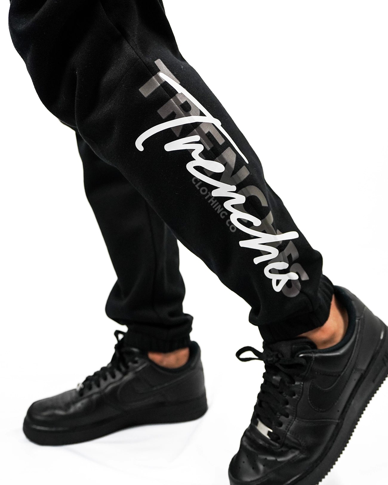 Trenches_trackpants_Script_black1.webp